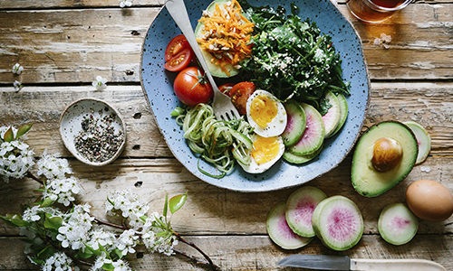 Flat lay style photo of a fresh salad 